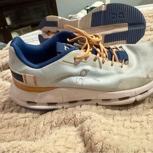 On cloud Running White and Navy Sneakers with Orange Laces